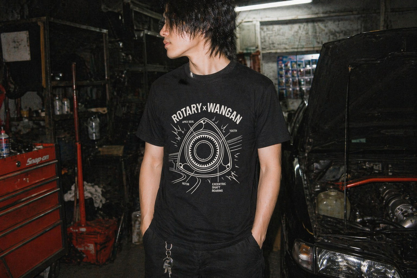 Apex Seal Rotary Tee — film-camera lifestyle shot — Hachiroku Apparel
