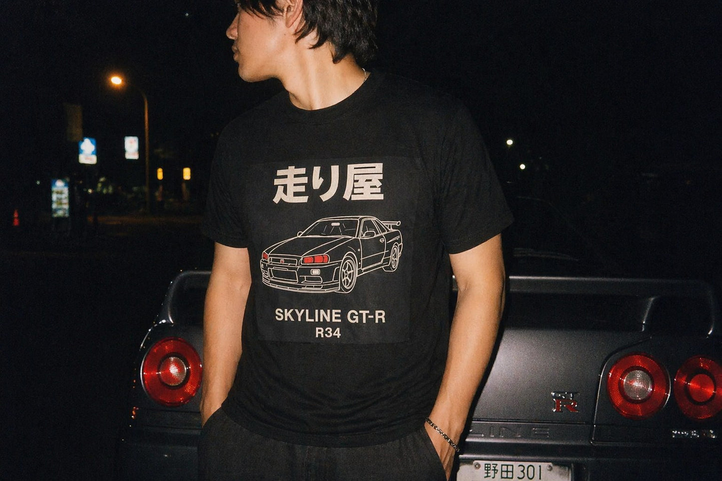 Hashiriya R34 GT-R Tee — film-camera lifestyle shot — Hachiroku Apparel